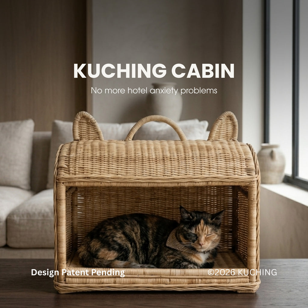 A wicker-style cat hutch or Kuching cabin with cat ears on top, shown on a table in a living room with a calico cat resting inside. Large text reads 'KUCHING CABIN' and smaller text says 'No more hotel anxiety problems' and 'Design Patent Pending'.